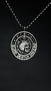 Continental Gold Coin by John Wick A 2.5cm round piece inspired by the John Wick Continental coin. On the reverse, we engraved a cross outline with the phrase Memento Mori alongside the client’s date of birth. Width x Height: 25mm Material: Sterling Silver 925 • Worldwide Shipping • www.thevnts.com | Vanitas_vanitas