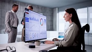 KPI Business Analytics Data Dashboard. Analyst Using Computer