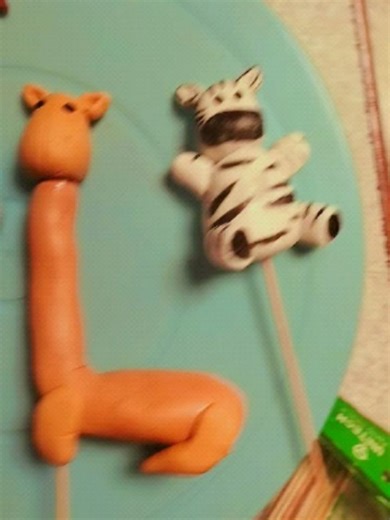 By Diksha Harchandani | A custom zoo-themed cake, fully handmade. From the giraffe to the lion, every fondant figure shaped with care for a perfect little... | Instagram