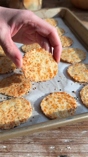 RECIPE: Black Pepper Asiago Crackers (makes ~40) 1 cup all purpose flour 3/4 cup shredded asiago cheese 1 tsp salt 3/4 tsp coarsely ground black pepper 1/3 cup butter, cubed and room temp 1/4 cup milk 2-3 tbsp everything bagel seasoning (we love the @simplyorganic blend) Stir together the flour, cheese, salt and pepper. Add the butter and use a pastry cutter or your hands to mix until the dough is crumbly. Stir in the milk, then use your hands to gently knead just until the dough comes together.