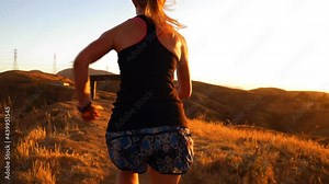 Woman Trail Running to Hilltop 4K