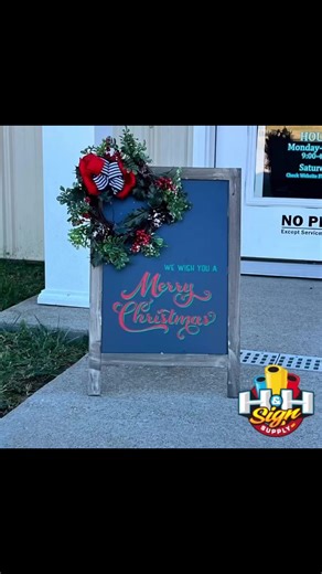You can customize almost anything with Orafol vinyl.🎄This adorable sidewalk sign started out blank and end up amazing!🤩 By adding Oracal 631 removable vinyl and a cute wreath with a bow, this boring sign was jazzed up and ready to great Christmas shoppers. Easy, quick and oh so FUN! #wesupplyyoucreate #hhsignsupply #orafol #oracal #oracalvinyl #christmasgiftsideas Craft_with_Orafol | H & H Sign Supply