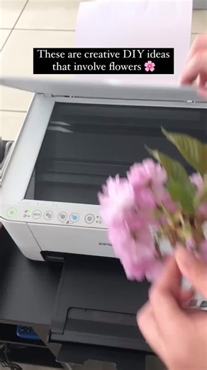 Here are four creative DIY flower projects: 𝟏. 𝐅𝐥𝐨𝐫𝐚𝐥 𝐒𝐜𝐚𝐧𝐧𝐞𝐝 𝐀𝐫𝐭 Place fresh flowers on a scanner bed, scan them at a high resolution, and print the image. This technique captures the details and colors of the flowers, resulting in stunning, frame-worthy art. 𝟐. 𝐅𝐥𝐨𝐚𝐭𝐢𝐧𝐠 𝐅𝐥𝐨𝐰𝐞𝐫 𝐌𝐮𝐠 𝐃𝐢𝐬𝐩𝐥𝐚𝐲 Attach a mug to two wires, bend the wires to form a flowing shape, and secure the other end to a plate. Adorn the wires and mug with flowers to create the illusion of