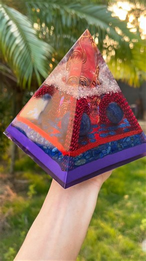 This orgonite pyramid seamlessly blends the depth of blue with the fiery energy of flame, symbolizing the powerful union of the ocean and fire. 🌊🔥 The blue evokes tranquility and healing, like the vast sea calming the mind and soul. The flame represents passion, transformation, and limitless energy, sparking creativity and change. 💫 Crafted with precision and high-quality materials, this piece brings both energy healing and artistic beauty to any space. 🎨 It’s more than an energy tool—it’s a