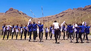This is Mohobelo performance from Motseki Community Library & Talent Centre . And this style is called 'Mako. The origins of mohobelo stretch back to the aftermath of the Lifaqane wars and the Great Trek. In the late 1800s, even though most of the unrest had subsided, Basotho men were still guarding outposts in the Maluti Mountains. They would do this for days on end, spending their time singing, and eventually they began to add energetic movements to accompany their voices. This was done while 