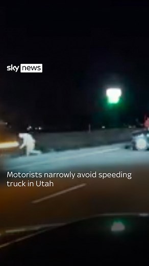 Stranded motorists and trooper narrowly avoid speeding truck in Utah | Sky News