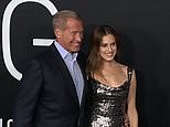 Allison Williams poses with her father Brian on the 'M3gan' premiere red carpet