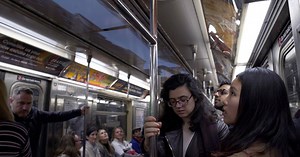 ian callender projects new york cityscape on the ceiling of moving subway trains