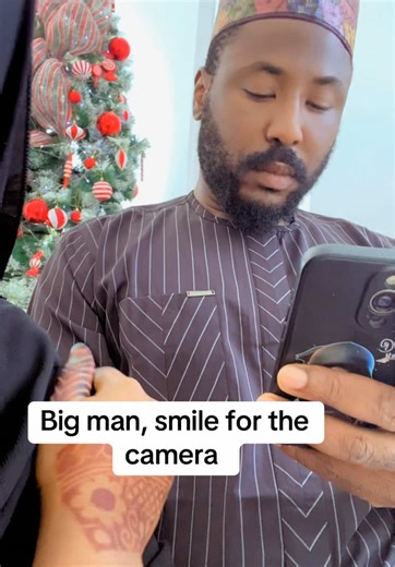 Big Man Smiling for the Camera