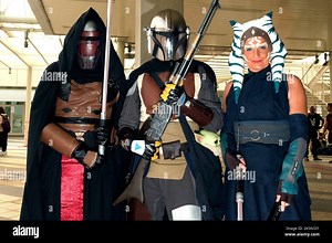 Rome, Italy. 09th Oct, 2022. Cosplayers pose for a photo during the 29th edition of Romics, an international exhibition of comics, animation, video games, cinema and entertainment. The term "Cosplay", a constraint of "costume play", indicates the practice of wearing a costume that represents a fictional character. Credit: SOPA Images Limited/Alamy Live News Stock Photo - Alamy