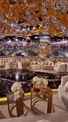Saudi Arabia 🇸🇦 witnessed a wedding project in 2022. Gold shells to create the tornados & wavy steel structure furnished with more than 100 thousand of “Swarovski almonds” all over the side walls with LED screens in the background 🔥 #wedding2025 #bride2025 #wedding #weddingplanner #weddingphotography #walidbaz #indianwedding #weddingdecoration #bazevents #weddingideas #weddingoftheyear #weddingdesigner #weddingdesign #riyadweddings #lebaneseweddings #fairytalewedding #dreamwedding #saudiweddi