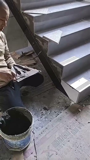 Installation of triangular ceramic tiles on stair edge #shorts