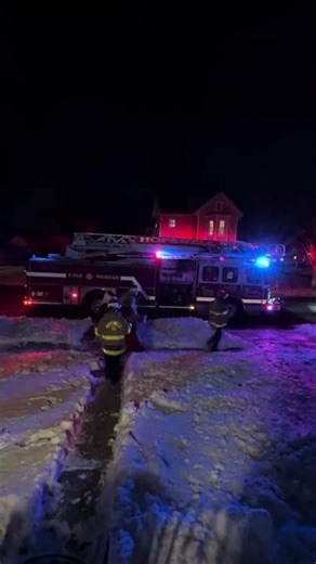 Santa Claus And Firefighter Elves And Fire Engine In The Snow 12/15/25