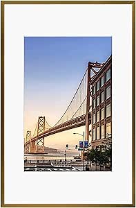 Frametory, 11x17 Aluminum Picture Frame - 11x17 Bronze Frame with Removable Mat for 8x12 Photo - 17x11 Durable Metal Frame with Real Glass - Sawtooth Hanger for Easy Wall Display - 1 Pack