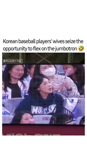 Funnybrothaa on Instagram: "Korean baseball game, the wives of the players are stealing the show! The moment the jumbotron showed one of the player's wives onscreen, she immediately got to work serving. When the camera went back to the players to show their reaction, some hilarious conversations were caught on camera, including where he said, "She's driving me crazy." However, she wasn't the only wife who made a scene When the camera went to another womanWhen the camera went back to the players 