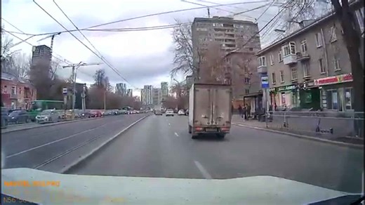 Motorcycle rider crashes into the back of car in Russia