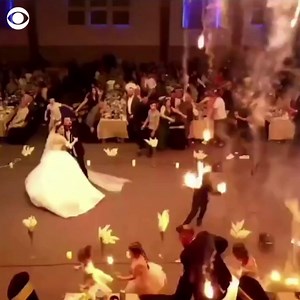 Fire rained down inside a wedding venue in northern Iraq on Wednesday, killing at least 93 people and leaving 100 more injured, an Iraqi official said. Fireworks inside the venue sparked the deadly blaze, according to emergency services and witnesses. https://cbsn.ws/46dKBlO | CBS News