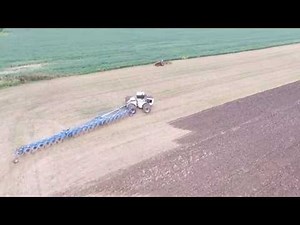 Big Bud Pulling HUGE 21 Bottom Plow!!!