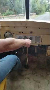 1954 GMC school bus on the road