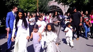 Kim and Kourtney Kardashian Arrive in Armenia for Kids' Baptism