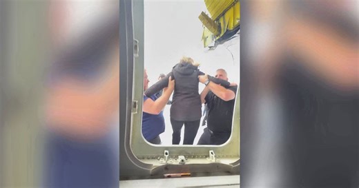 Video from inside the upside down plane shows the intense moments of passengers exiting