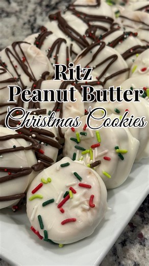 Stephenie on Instagram: "These little cookie bites have been part of my Christmas season since elementary school. A childhood friend taught me how to make them, and I instantly fell in love. I usually think white chocolate is too sweet, but the salty Ritz crackers and creamy peanut butter balance it perfectly. They’ve become a tradition in my home too—my little kids always helped me assemble these when they were young. It’s the easiest, quickest, most fun Christmas-time activity… and the cookies