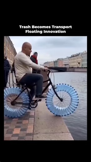 sci || tech || historym on Instagram: "This video features a creative DIY project where a man converts a standard bicycle into a watercraft using recycled materials. The video shows a man riding a bicycle with wheels modified for buoyancy. Instead of rubber tires, the wheels are fitted with dozens of clear plastic water bottles arranged in a circular pattern. Key Features of the Design Buoyancy: The air trapped in the plastic bottles provides enough upward force to keep the heavy bike and the ri