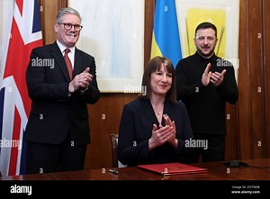 From left, British Prime Minister Keir Starmer, Britain's Chancellor of the Exchequer Rachel Reeves and Ukrainian President Volodymyr Zelenskiyy applaude during a video conference meeting with Ukraine's Finance Minister Sergii Marchenko in London, England, March 1, 2025. (Toby Melville/Pool Photo via AP Stock Photo - Alamy