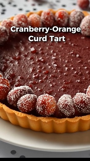 Cranberry Orange Curd Tart Bright, sweet-tart, and festive—this cranberry orange curd tart looks elegant but comes together easily. Cranberry Orange Curd Tart Ingredients 🥧 1 tart crust (baked) 🍊 ½ cup orange juice zest 🍒 2 cups fresh or frozen cranberries 🧈 4 tbsp butter 🍚 1 cup sugar 🥚 3 eggs Directions Simmer cranberries, sugar, and orange juice until berries burst. Blend until smooth, then strain. Whisk in eggs and cook on low until thickened. Add butter and whisk until glossy. Pour in