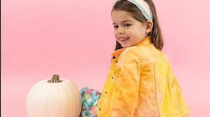 Fall is almost here and my daughter Lily has been asking for another jean jacket. It was the perfect opportunity for me to try tie-dying jean material for the first time. I used the TulipColorCrafts One Step Tie-Dye Mega Value Kit. There is enough bottles to tie dye multiple projects and there is a bonus fabric glitter spray. It was the perfect pop of sparkle to make my daughter obsessed with this jean jacket! Check out this easy project! | Creative Living with Lynn Lilly