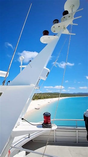 Whitehaven Beach in the Whitsundays. Like jumping into a postcard. Or a screen saver. Whitehaven Beach is located on Whitsunday Island in the Whitsunday Islands National Park, off the coast of Queensland, Australia. It's part of the Great Barrier Reef World Heritage Marine Park and is known for its seven-kilometre stretch of fine, white silica sand. The sand is 98 per cent pure white silica, which gives it a brilliant, near luminescent colour. Only accessible by boat, getting from Airlie Beach t