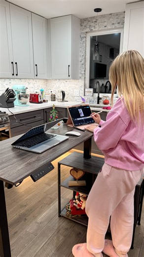 Iryna Bodnar Ugc Influencer on Instagram: "This desk from @yitahome.us fits perfectly into my new kitchen and looks very modern and stylish🩶 I love that I can work both sitting and standing, which makes it extremely convenient for long workdays.💻The adjustable height is smooth and easy to use. One of the best parts is that I can edit videos without stepping away from the stove, which saves me a lot of time and keeps everything in one place. 💖 The desk is sturdy, spacious, and very practical. 