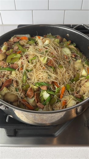 Pancit Bihon Guisado is more than just a noodle dish; it’s a symbol of long life, celebration, and the heart of every Filipino gathering. Whether you’re preparing this for a birthday, a potluck, or just a cozy family dinner, this recipe hits all the right notes with its savory blend of perfectly seasoned noodles, crisp vegetables, and tender meat. Give it a generous drizzle of calamansi juice for a citrus note that balances the flavors. #filipinofood #pancitbihon #stirfrynoodles #easydinners #pa