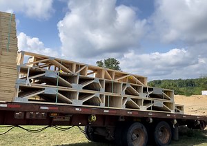 Installing Basement Floor Trusses - Fletcher Creek Cottage
