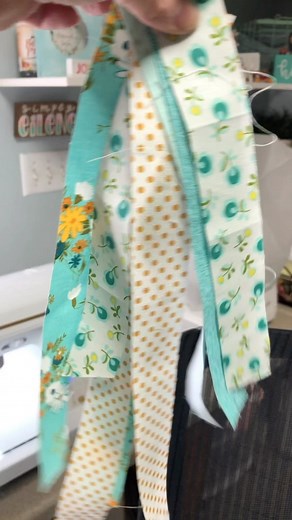 Eilene Johnson- Pattern Designer on Instagram: "Let’s get fancy! -First, gather some coordinating fabric strips, some #insulbright , some #heatnbond by @thermoweb and make a template from some cardstock. -Cut your fabric scraps into strips 1 1/4” wide. -Cut a piece of insulbright 2” larger than the size you want (I cut mine at 10”). -Sew strips onto the insulbright on the diagonal, then press and trim to desired size. -Trace template onto the paper side of the heatnbond. Cut out and iron to the