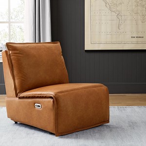Summer lounging just got a whole lot better with our NEW Power Recliner Lounge Chair. Did we mention it has a built-in USB port? because staying charged while you chill is a must. Click the link below to shop. cur.lt/0cgv70ccj | Pottery Barn Teen
