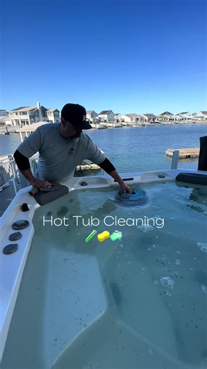 Hot tub cleaning with a view😍 #BackyardOasis #ResortVibes #PoolCleaning #pov #fyp
