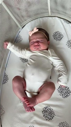 Watch our baby do the newborn scrunch