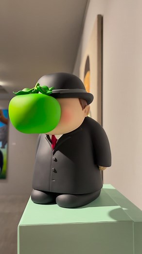 YangGallery | The Son of Man : The Son of Man is a 1964 painting by the Belgian surrealist painter René Magritte. It is perhaps his best-known artwork. Magritte painted it as a self-portrait. The painting consists of a man in an overcoat and a bowler hat standing in front of a low wall, beyond which are the sea and a cloudy sky. What is the message of The Son of Man painting ? The meaning of the painting is cryptic, but one can extrapolate some meaning from the words of Magritte himself. He spok