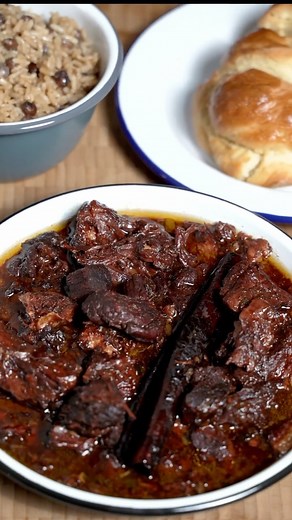 Riaz on Instagram: "Guyanese 🇬🇾 Pepperpot with Oxtail, Lamb Shoulder and Beef Brisket plus soft plait bread and Rice and peas. Though you can sometimes find Pepperpot any time of year it is especially loved at X-mas🎄 Rooted in the culture of the Indigenous AmerIndian tribes such as the Taino and Arawak. Much different than 🇺🇸 or 🇯🇲 Pepperpot thanks to the use of Cassareep an incredible Black fermented Cassava syrup. Recipe online @guardian 