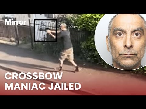 Police release CHILLING footage of the man who hunted them with a crossbow