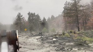 ATTN Drivers, please stay off the roads, if able. This video was taken by our #Caltrans8 Cajon Crew team wearing a head camera of SR-2 and Sheep Creek. Flash floods, high winds and the rain are making it a big challenge for all. Please be patient while we work. | Caltrans District 8