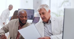 Teamwork, review and training with business people at computer for project management, planning or web design. Collaboration, goal and documents with employee in digital agency for marketing strategy