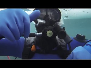 Female Diver is Diving with TOPSTAR Neoprene Drysuit and Cressi Full Face Mask