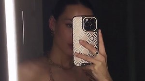 Chelsea legend's daughter shows off figure in backless leopard-print swimsuit