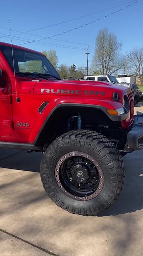 Exploring Off-Road Adventures in a Red Jeep Rubicon