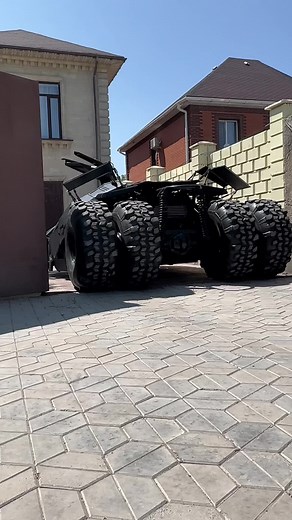 Futuristic Replica Batmobile Showcased in Driveway