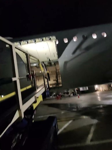 Walking Off the Aircraft via the Belt Loader After Offload