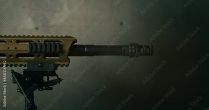 Super slow motion close of shoot of machine fire gun during training in a shooting range. Shooting and Weapons