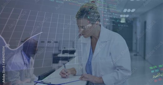 Female doctor writing patient notes at chart station while digital graphs rising for data review